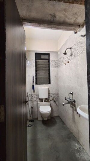 Bathroom in 2 BHK Apartment at Samarth Sai Seasons Sahara, Kalyan East – for Rent