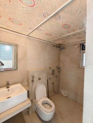 Bathroom in 3 BHK Apartment at Puranik Rumah Bali, Ghodbunder Road – for Rent