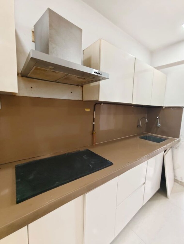 Kitchen, puranik-rumah-bali 3 Bedroom 700 Sq.Ft. Apartment In Ghodbunder Road Thane 10620597