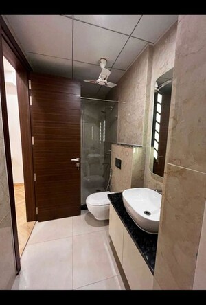 Bathroom in 3 BHK Apartment at Ambience Creacions, Sector 22 – for Rent