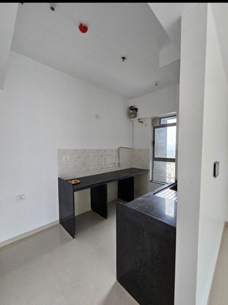 Kitchen, kalpataru-immensa 3 Bedroom 996 Sq.Ft. Apartment In Kolshet Road Thane 10620641