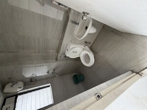 Bathroom in 1 BHK Apartment at Runwal Gardens Phase I, Dombivli East – for Rent