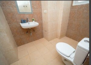 Bathroom in 2 BHK Apartment at Signature Global Orchard Avenue, Sector 93 – for Sale