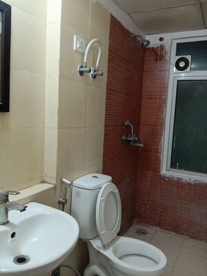 Bathroom in 2.5 BHK Apartment at Mahagun My Woods, Sector 16c Greater Noida – for Rent
