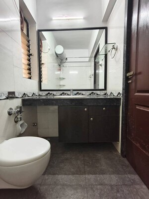 Bathroom in 2 BHK Apartment at Raheja Heights Phase 2, Goregaon East – for Rent