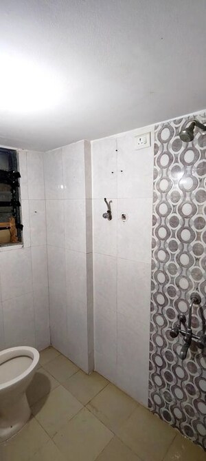 Bathroom in 2 BHK Apartment at Kings Anand Dham, Nahur East – for Sale