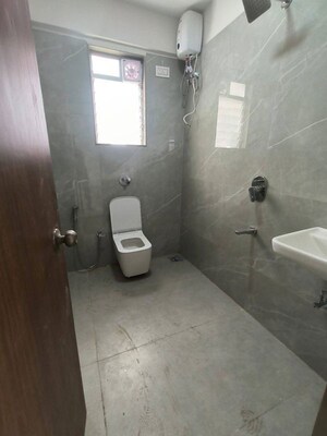 Bathroom in 2 BHK Apartment at Pratham Prerana CHS, Andheri West – for Rent