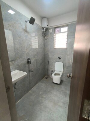 Bathroom in 2 BHK Apartment at Pratham Prerana CHS, Andheri West – for Rent