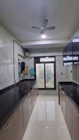 Kitchen in 3 BHK Apartment at Poonam Vaishno Heights, Malad East – for Rent