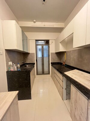 Kitchen in 2 BHK Apartment at Rustomjee Summit, Borivali East – for Rent