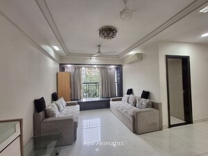 Living Room in 4 BHK Apartment at Raheja Odyssey, Kandivali East – for Sale