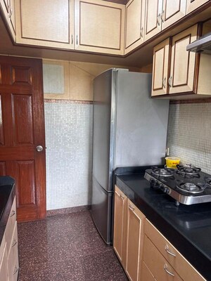 Kitchen in 2 BHK Apartment at Dev Shakti, Santacruz West – for Sale