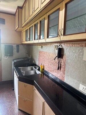 Kitchen in 2 BHK Apartment at Dev Shakti, Santacruz West – for Sale