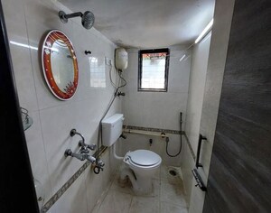 Bathroom in 2 BHK Apartment at Mohini Tower, Khar West – for Rent