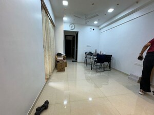 Living Room in 1 BHK Apartment at Lodha Palava Downtown, Dombivli East – for Sale
