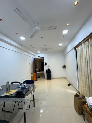 Living Room in 1 BHK Apartment at Lodha Palava Downtown, Dombivli East – for Sale