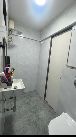 Bathroom in 1 BHK Apartment at Balkum Pada – for Sale