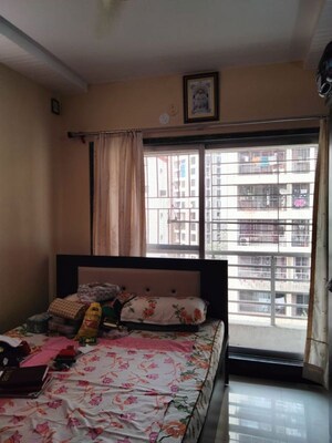 Bedroom in 2 BHK Apartment at L And T Seawoods Residences, Seawoods – for Rent