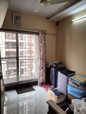 Living Room in 2 BHK Apartment at L And T Seawoods Residences, Seawoods – for Rent