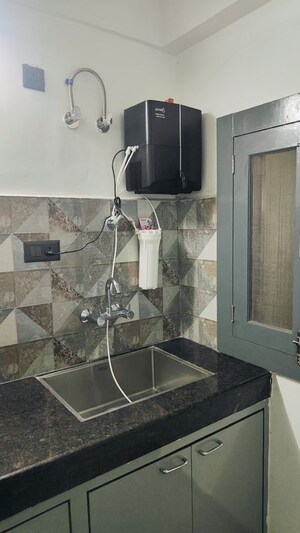 Kitchen in Studio Builder Floor at Sushant Lok I – for Rent