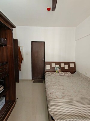 Bedroom in 2 BHK Apartment at Puranik Abitante, Bavdhan – for Rent