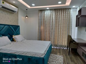 Bedroom in 3 BHK Apartment at DLF The Wellington Estate, Dlf Phase V – for Rent