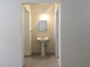 Bathroom in 2 BHK Apartment at Royal Classic Co Op Society, Andheri West – for Sale