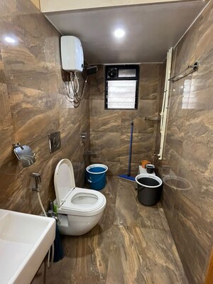 Bathroom in 2 BHK Apartment at Siddhi Highland Park, Kolshet Road – for Rent