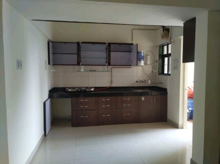 Kitchen, bu-bhandari-edenn-towers 2 Bedroom 850 Sq.Ft. Apartment In Wakad Pune 10622452