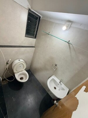 Bathroom in  Office Space at Sheladia One World West, Ambli – for Rent