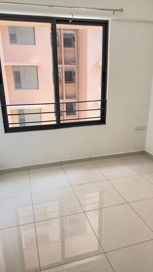 Room in 2 BHK Apartment at Ganesh Malabar County, Near Nirma University On Sg Highway – for Rent