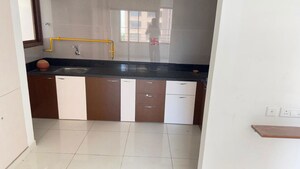 Kitchen in 2 BHK Apartment at Ganesh Malabar County, Near Nirma University On Sg Highway – for Rent