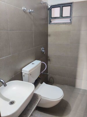 Bathroom in 2 BHK Apartment at Ganesh Malabar County, Near Nirma University On Sg Highway – for Rent