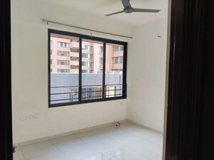 Room in 2 BHK Apartment at Ganesh Malabar County, Near Nirma University On Sg Highway – for Rent