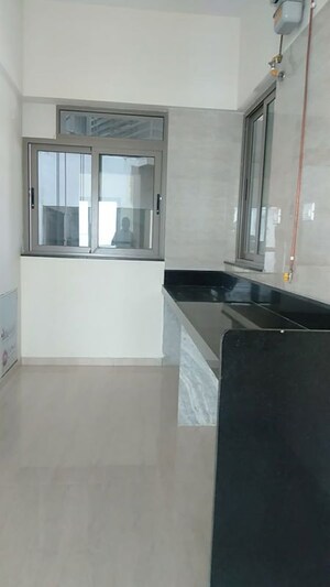 Kitchen in 3 BHK Apartment at Sheth Auris Serenity Tower 1, Malad West – for Rent
