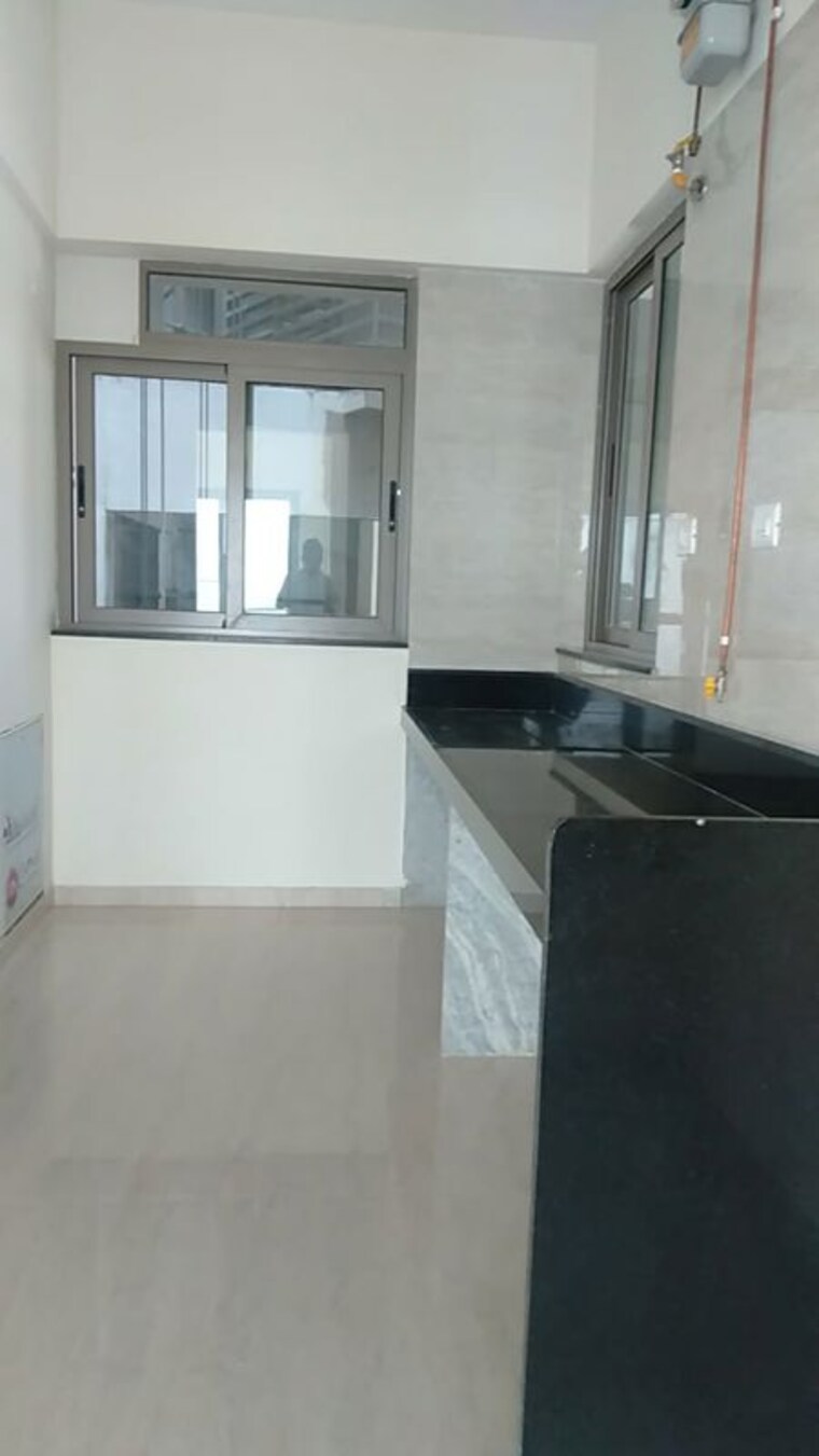 Kitchen, sheth-auris-serenity-tower-1 3 Bedroom 1233 Sq.Ft. Apartment In Malad West Mumbai 10622521