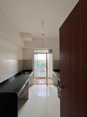 Kitchen in 2 BHK Apartment at Lodha Amara, Kolshet Road – for Sale