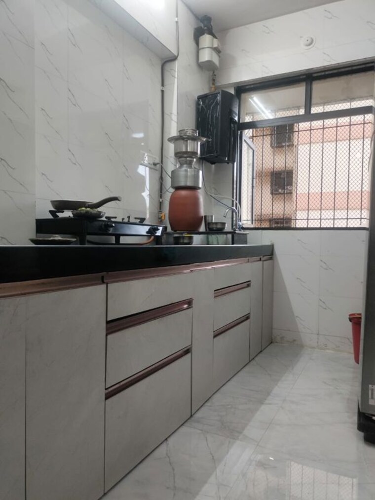 Kitchen, unnathi-woods-phase-1-and-2 1 Bedroom 415 Sq.Ft. Apartment In Ghodbunder Road Thane 10622569
