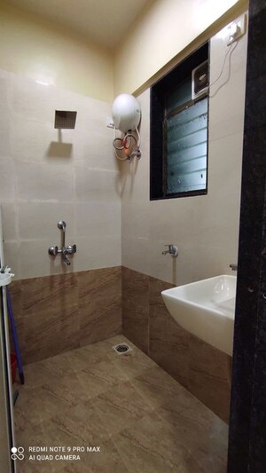 Bathroom in 1 BHK Apartment at Onkar CHS, Goregaon East – for Rent