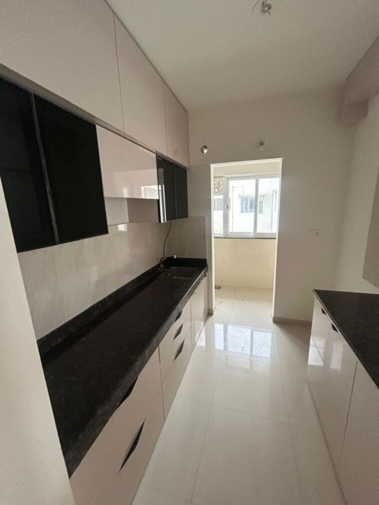Kitchen, k-raheja-sterling 2 Bedroom 1080 Sq.Ft. Apartment In Mohammadwadi Pune 10622673