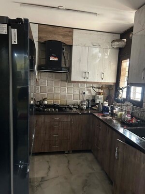 Kitchen in 3 BHK Apartment at Gayatri CGHS, Sector 45 – for Sale