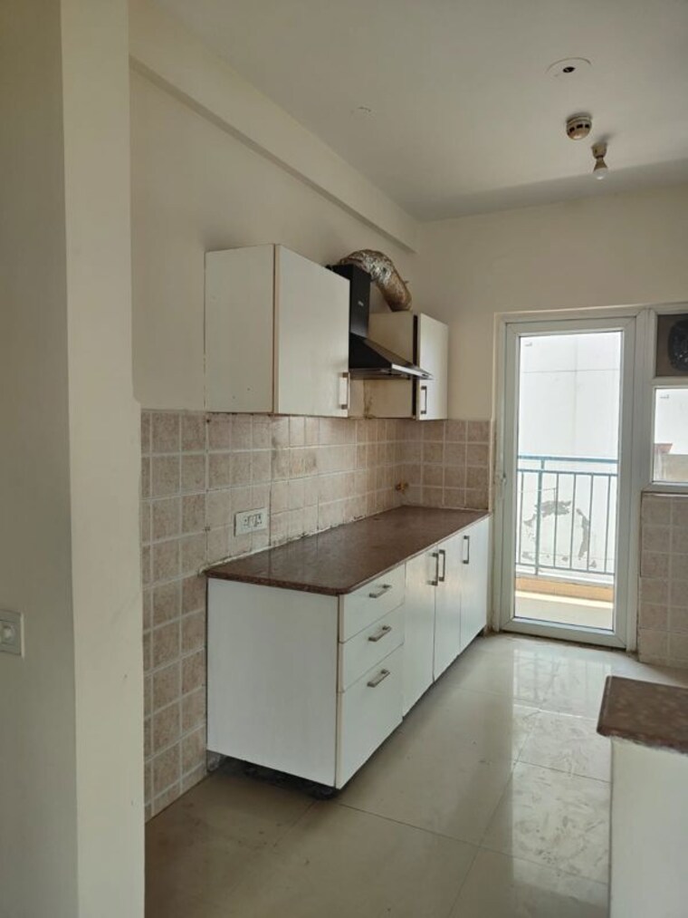Kitchen, unitech-the-residences-gurgaon 3.5 Bedroom 1850 Sq.Ft. Apartment In Sector 33 Gurgaon 10622697