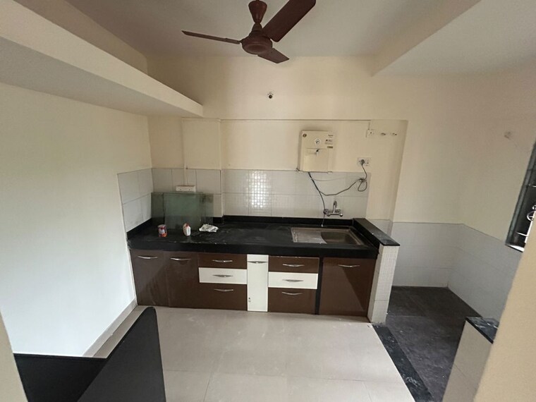 Kitchen, raheja-vistas-phase-ii 2 Bedroom 1100 Sq.Ft. Apartment In Mohammadwadi Pune 10622688