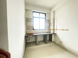 Kitchen in 2 BHK Apartment at Maninagar East – for Sale