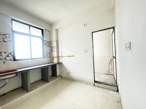 Kitchen in 2 BHK Apartment at Maninagar East – for Sale