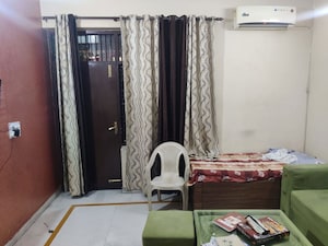 Living Room in 2 BHK Apartment at SS Mayfield Gardens, Sector 51 – for Rent