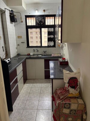 Kitchen in 2 BHK Apartment at Vijay Wimbledon Park, Vartak Nagar – for Rent