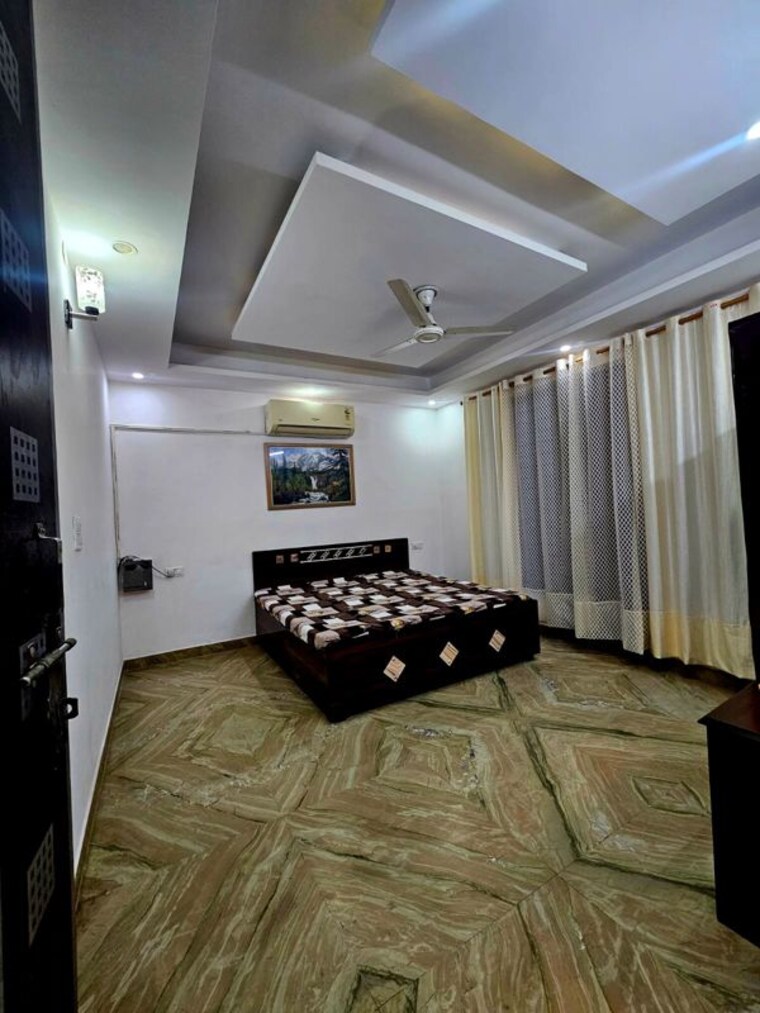 Bedroom, unitech-uniworld-gardens-2 2.5 Bedroom 1250 Sq.Ft. Apartment In Sector 47 Gurgaon 10622722