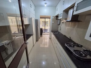 Kitchen in 3 BHK Apartment at Clover Acropolis, Viman Nagar – for Rent