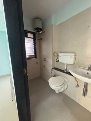 Bathroom in 2 BHK Apartment at Runwal Garden City, Balkum Pada – for Sale